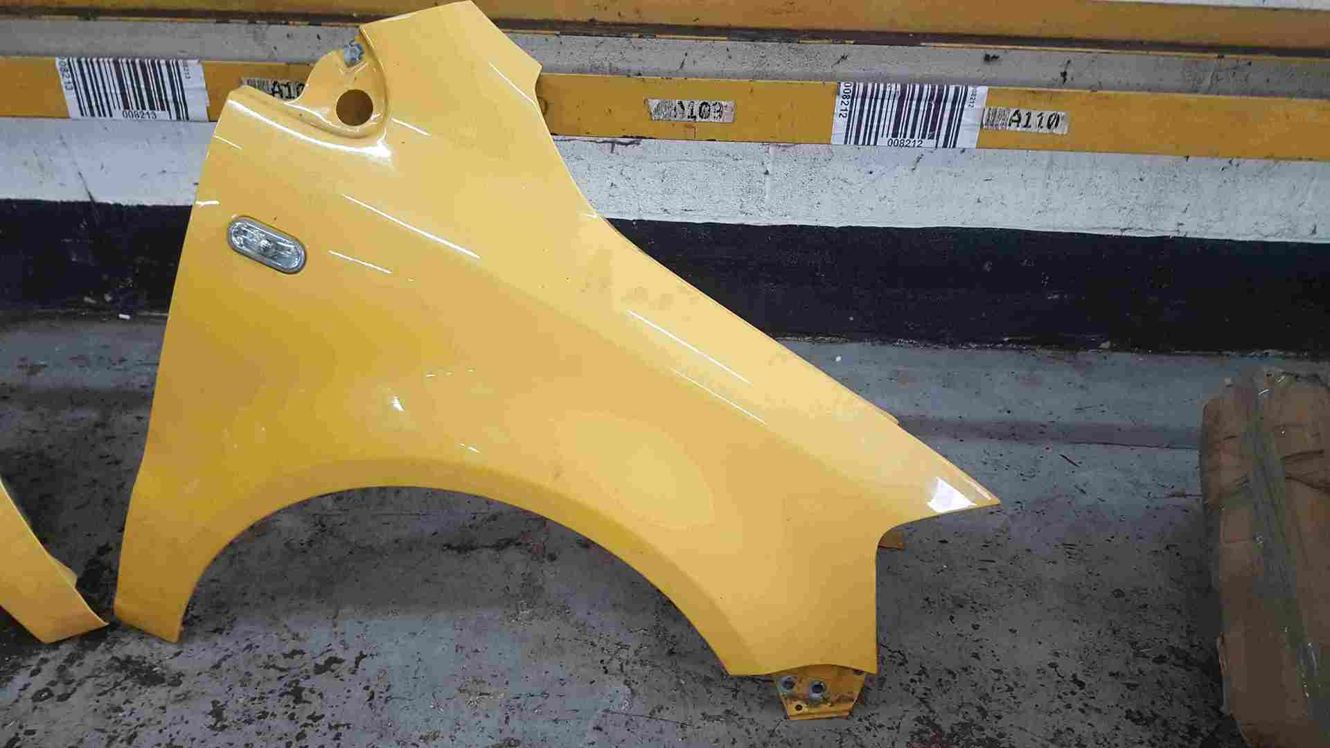 Volkswagen Fox 2005-2011 Drivers OS Wing Yellow LY1C