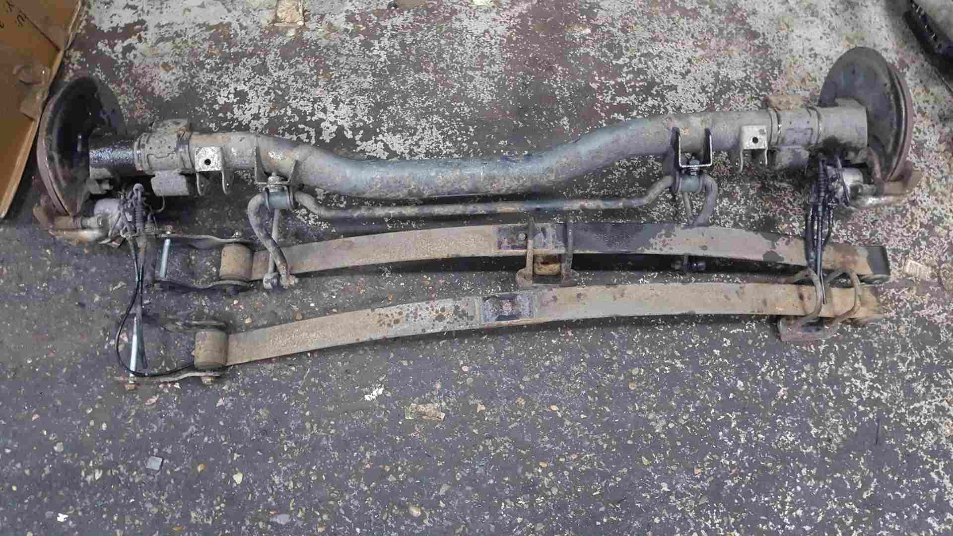 Volkswagen Caddy 2004-2010 Rear Axle Beam Complete + Leaf Springs + Calipers
